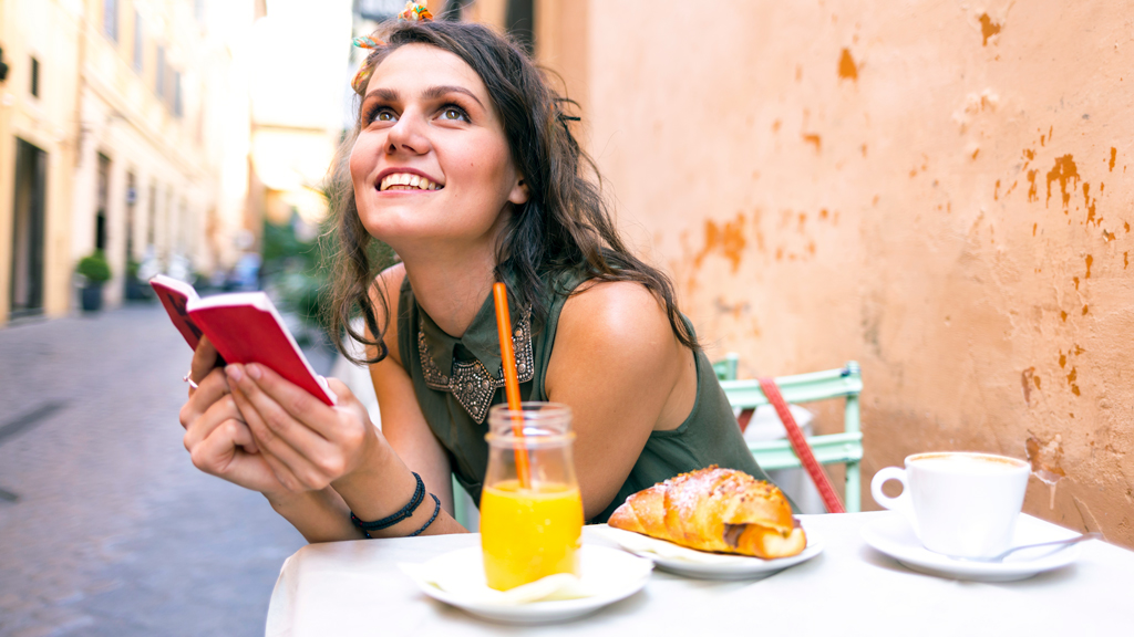 Woman at Italian street cafe