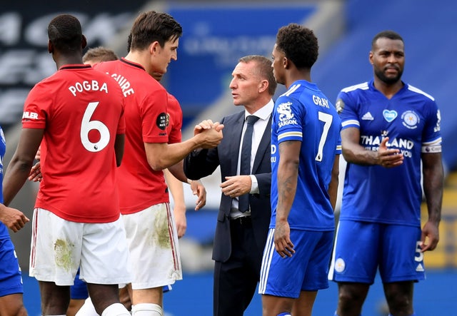 Harry Maguire shakes hands with Leicester City manager Brendan Rodgers after Manchester United beat the Foxes. The win meant they finished third in the Premier League and Leicester finished outside a Champions League place in fourth