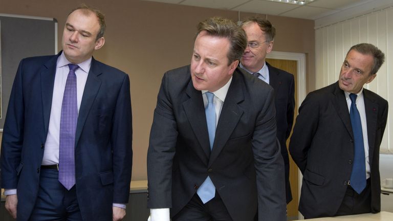 (left to right) Energy Secretary Ed Davey, Prime Minister David Cameron, Vincent de Rivaz, Chief Executive of EDF (Electricite de France) and Henri Proglio, CEO and Chairman of EDF as they examine site plans for the news Hinkly C nuclear power station at Hinkley Point, Somerset. Britain's first new nuclear power station in a generation is to be built under the Â£16 billion project which will create thousands of new jobs.