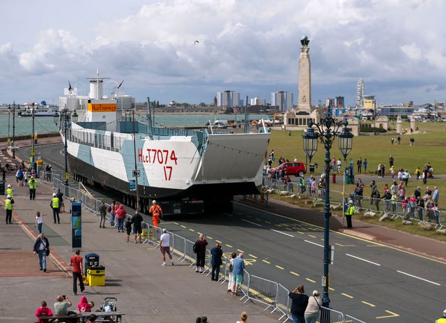 Restored World War Two landing craft LCT 7074 is transported from from the Naval Base in Portsmouth to its final resting place at the D-Day Story at Southsea