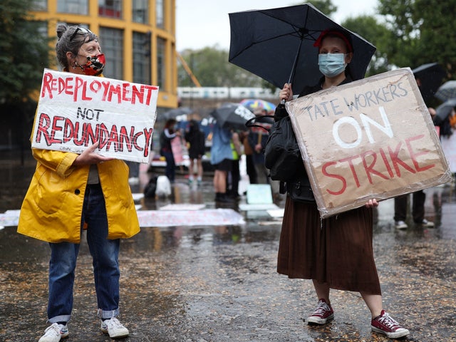 Tate Modern workers hold a strike outside the gallery in London, to protest the institution's announcement that it would cut more than 300 jobs from its commercial arm, Tate Enterprises