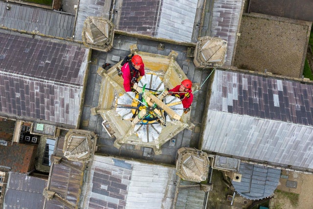 Father and son team Chris and Sam Milford from historic building conservation specialists WallWalkers begin restoration work on the spire of Norwich Cathedral, which stands at over 312ft high. The first known spire was completed in 1297 