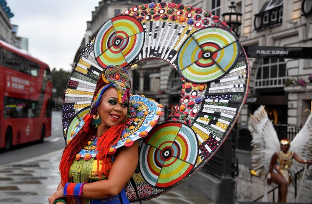 Caribbean soca dancers display their costumes as they promote the first ever digital Notting Hill Carnival, following the cancellation of the normal Carnival festivities due to the continued spread of the coronavirus disease, in London