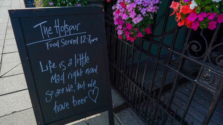 A sign is displayed outside a pub in Newcastle on September 17, 2020 in Newcastle upon Tyne, England