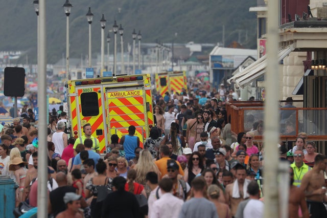 Emergency services make their way along the seafront on Bournemouth beach in Dorset on one of the hottest days of the year