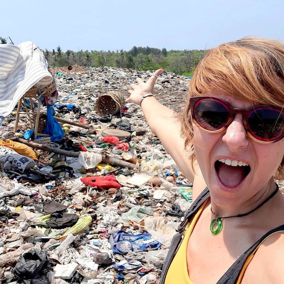 Sian clearing up the beach.