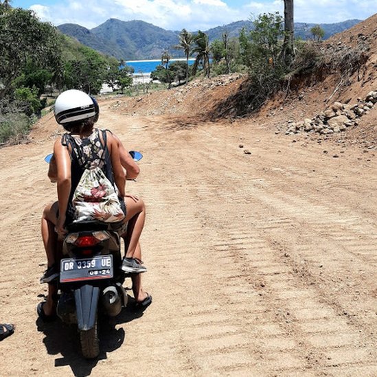 Sian on a motorbike.