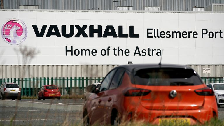 ELLESMERE PORT, - MARCH 17: Cars are parked outside the Vauxhall car assembly plant on March 17, 2020 in Ellesmere Port, England. The carmaker's parent company, PSA Group, said its plants would remain closed through March 27, citing a drop in demand and supply-chain disruption due to the COVID-19 outbreak. (Photo by Christopher Furlong/Getty Images)