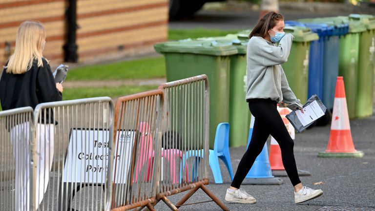 GLASGOW, SCOTLAND - SEPTEMBER 24: Students from Glasgow University attend a pop-up coronavirus testing centre at Murano Street Student Village on September 24, 2020 in Glasgow, Scotland. A considerable number of students have tested positive following an outbreak of Covid -19 at the halls of residence, 600 people are now self isolating. (Photo by Jeff J Mitchell/Getty Images)